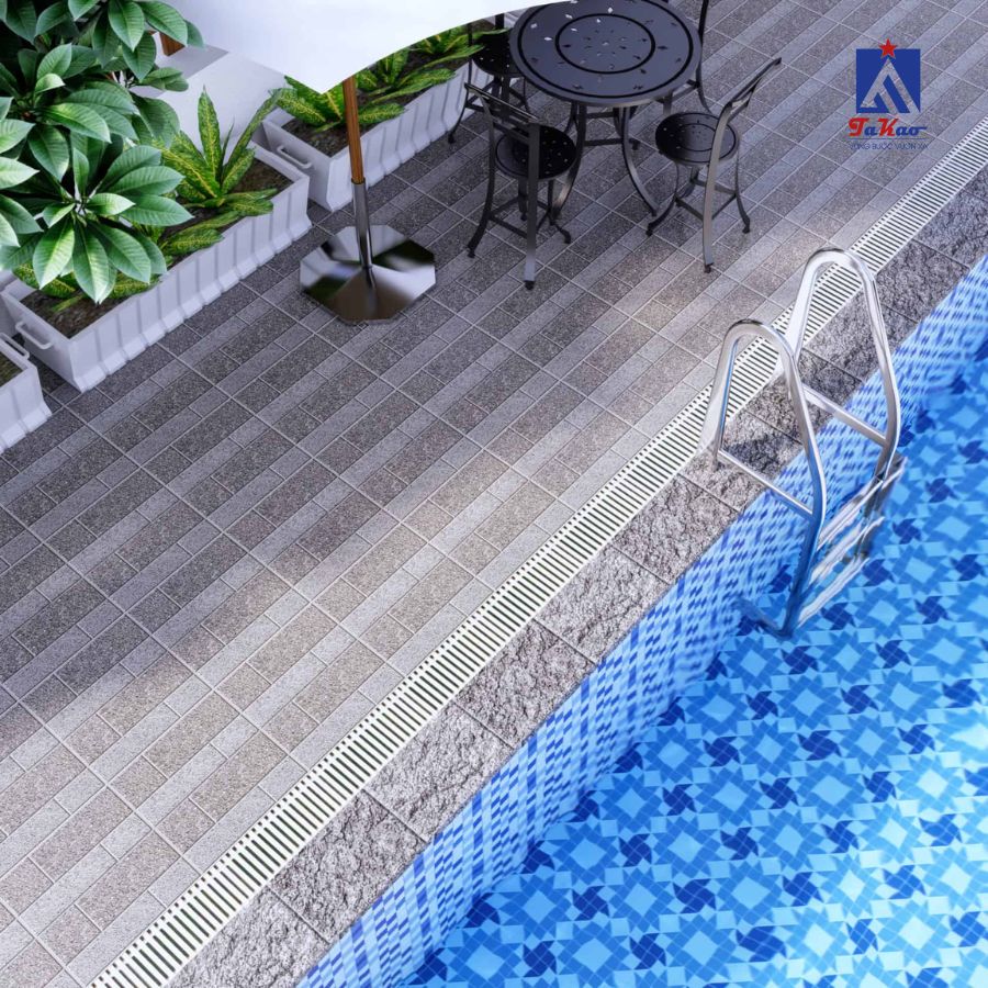 Gạch ceramic vân gỗ mang lại vẻ đẹp tự nhiên và ấm cúng cho khu vực xung quanh bể bơi